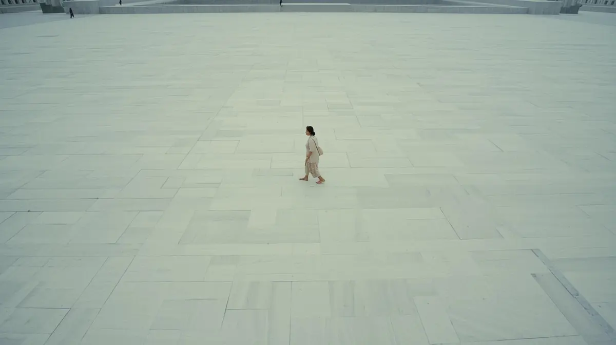 A clean minimal kitchen table with just a ceramic mug and a single open notebook, soft morning light coming through a window